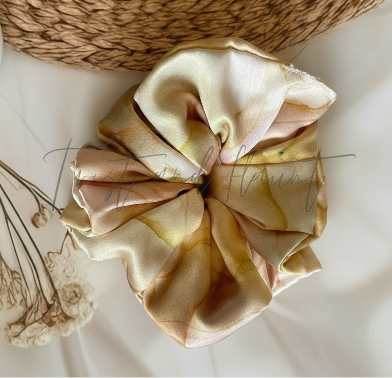 Floral patterned scrunchie on a textured surface