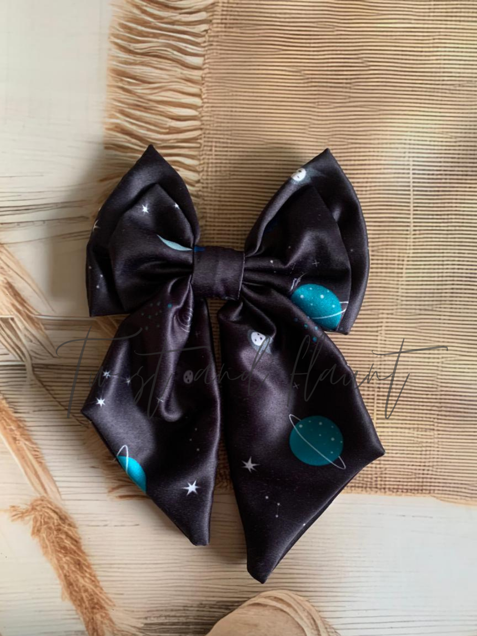 Dark Satin with a Celestial Pattern of Stars and Planets Double Layer Bow Clip